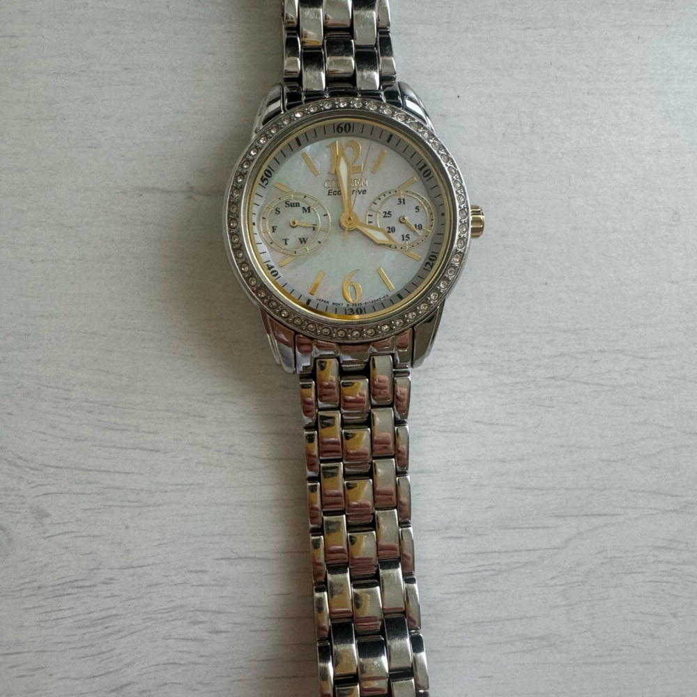 SOLD ON MERCARI Citizens Women’s Watch Silver with Gold accents